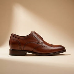 Scarpe con rialzo interno