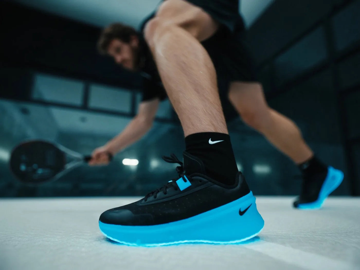 Padel player on court — ExtraCM insoles inside his sport shoes